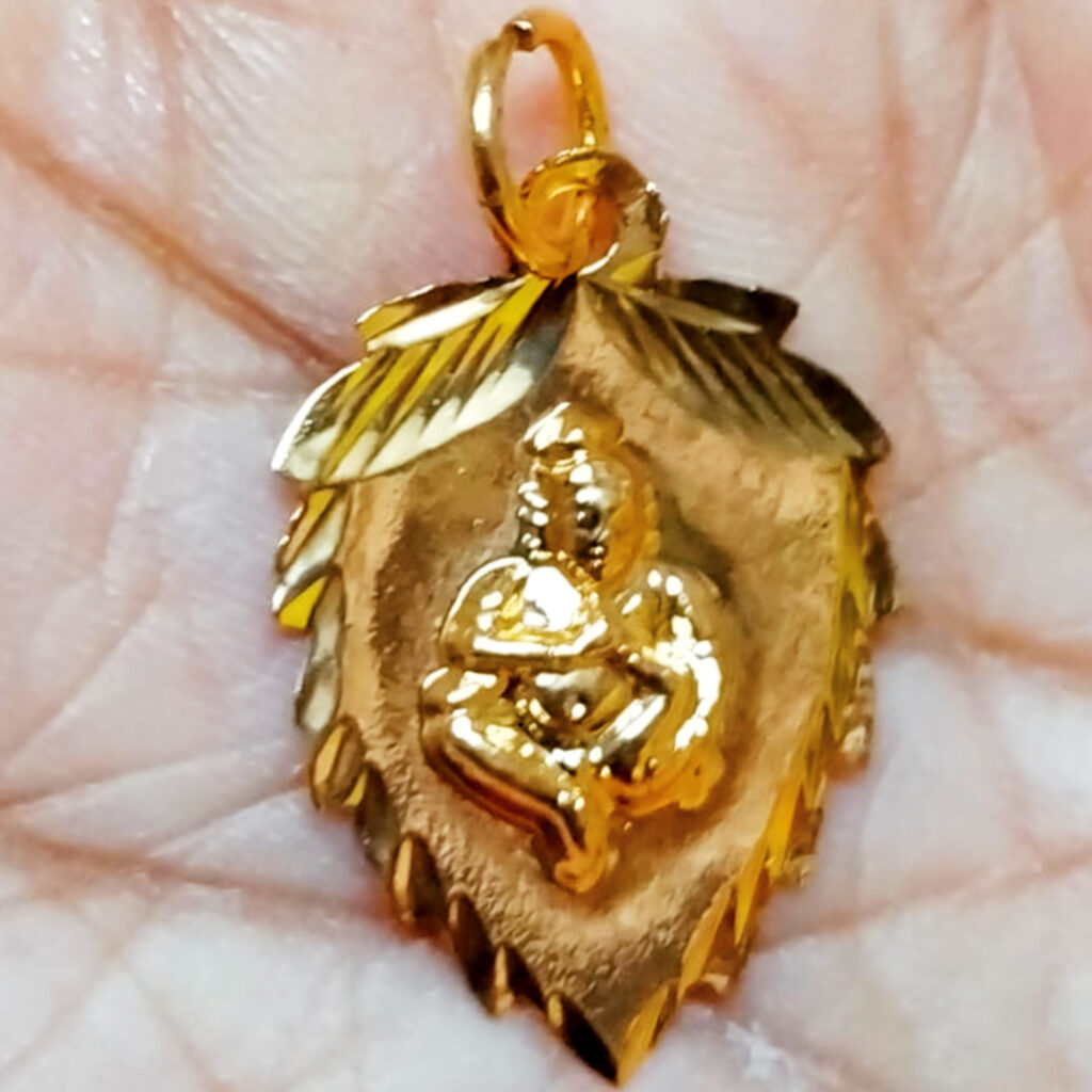 S9058288 Aadhyathmik Krishna on Leaf Pendant Mixed Metal 1inch